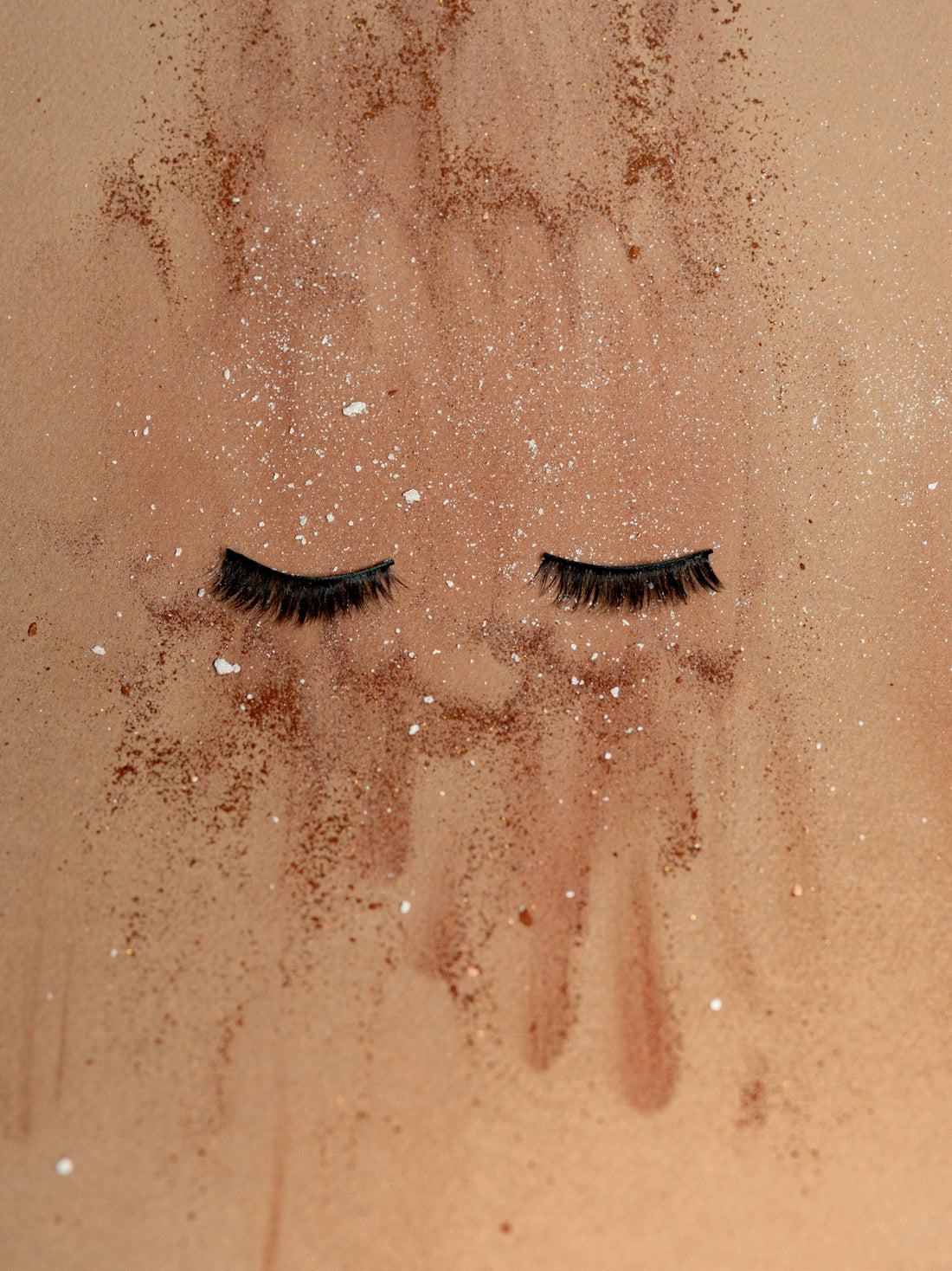a close up of a pair of eyelashes