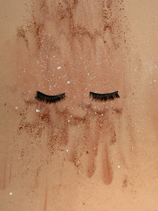a close up of a pair of eyelashes