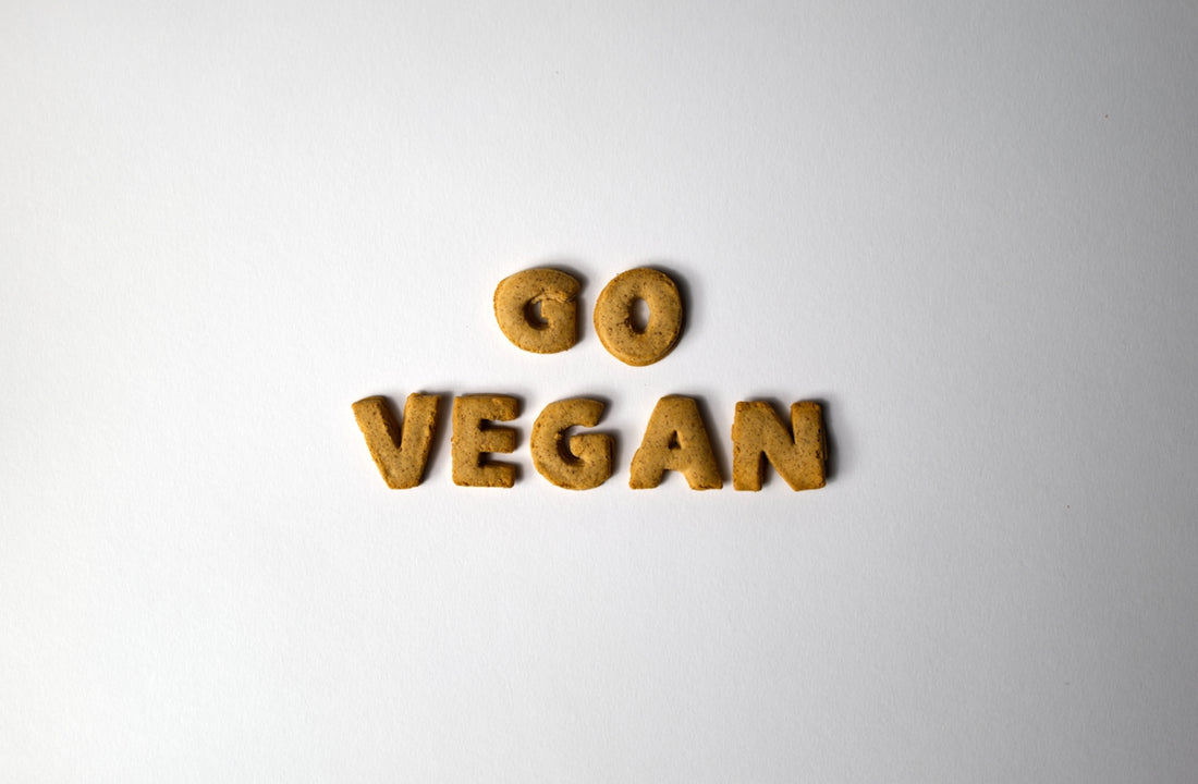 The word vegan spelled out with wooden letters