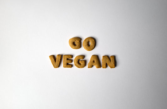 The word vegan spelled out with wooden letters